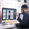 freelance graphic designer working at his home office
