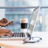 How a Fixed Rate Heloc Works - Woman Using Phone and Laptop