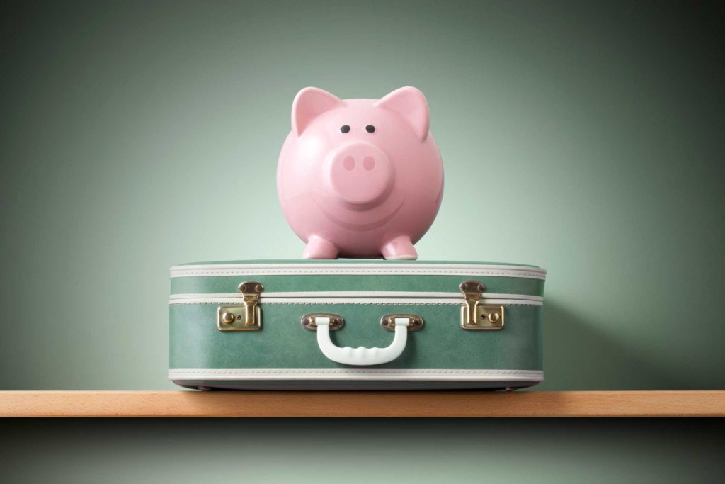 Piggy Bank on Travel Luggage