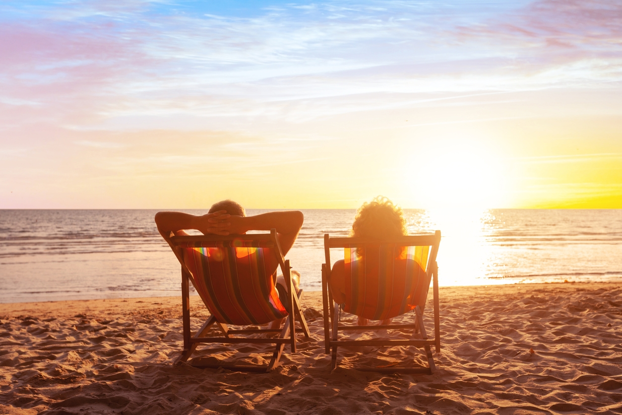 Couple enjoying retirement on beach