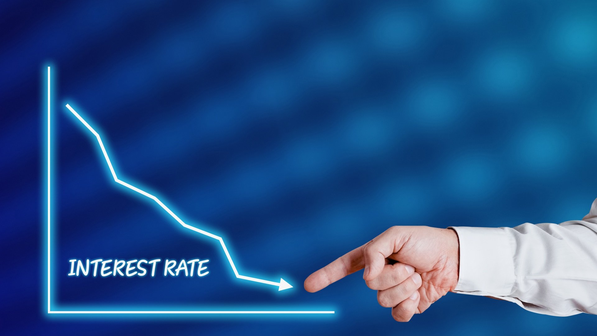 Graphic showing dropping interest rates and mortgage rates