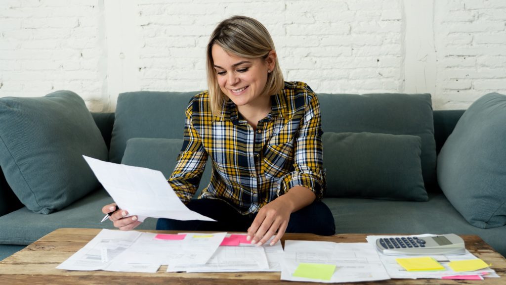 Woman engages in financial planning activities 