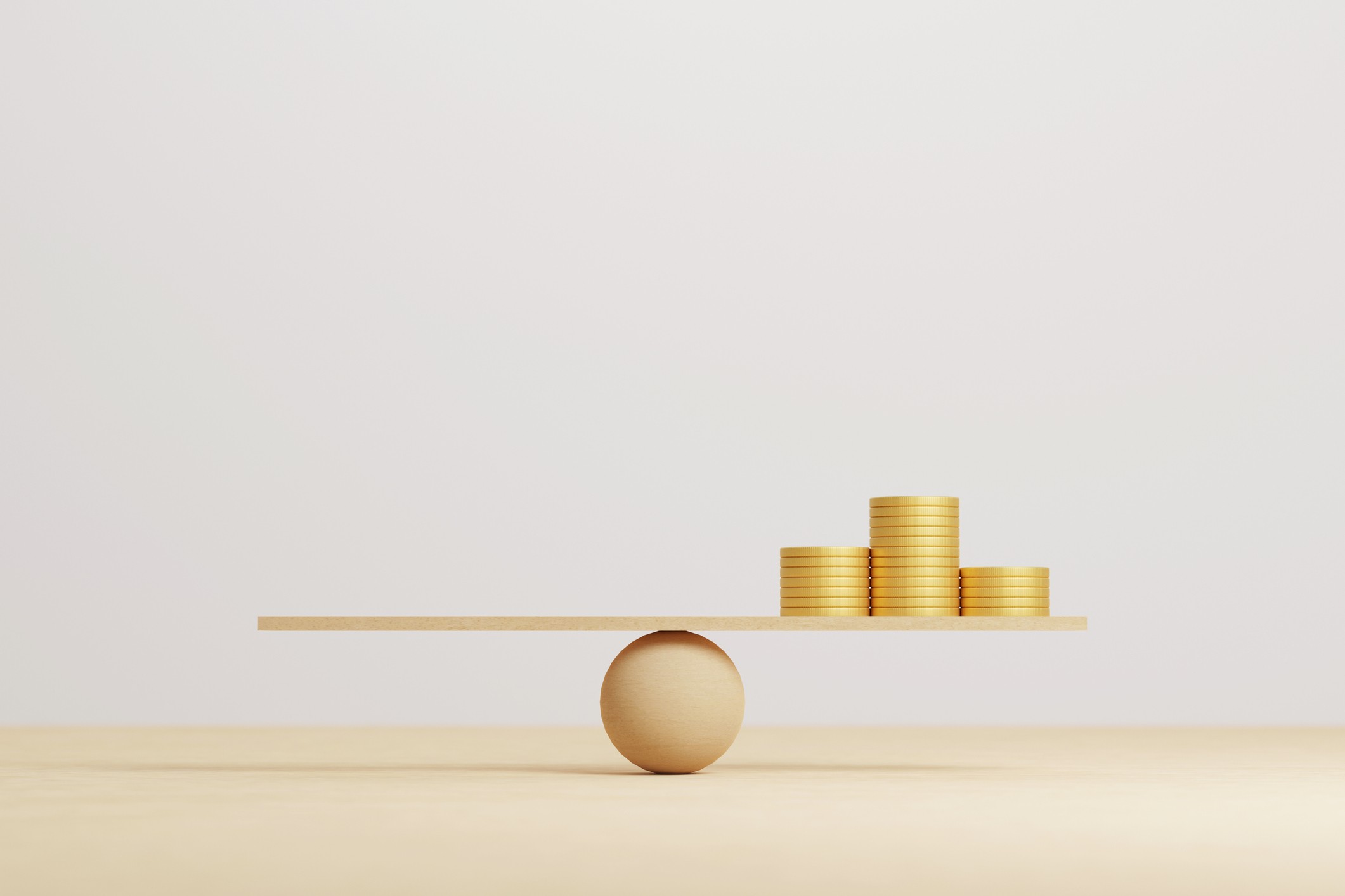 Money coin stack on wood scale seesaw