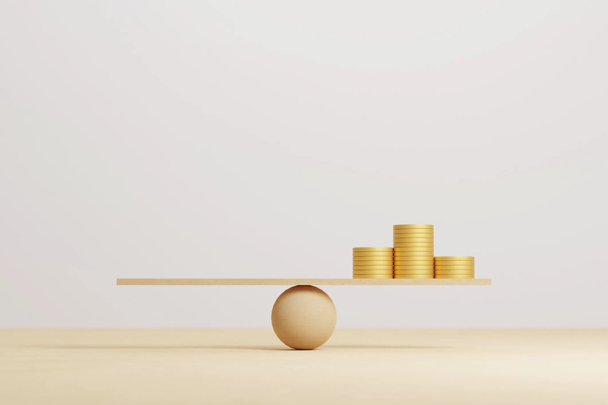 Money coin stack on wood scale seesaw